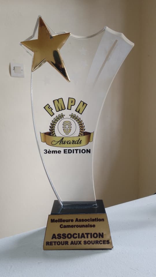 Trophée de la distinction reçue par Retour Aux Sources